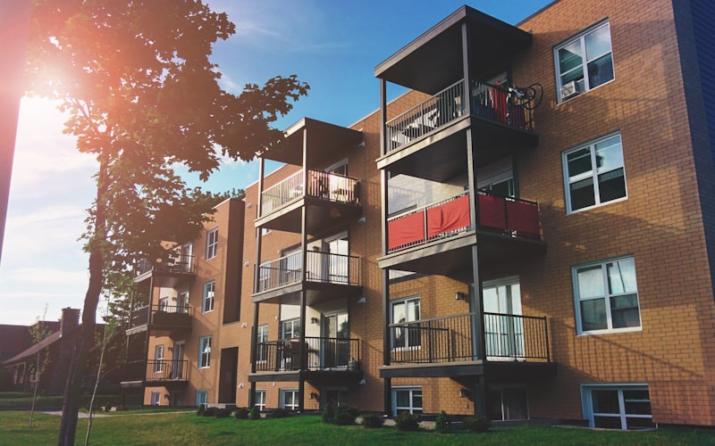 Large residential complex with multiple buildings and communal areas
