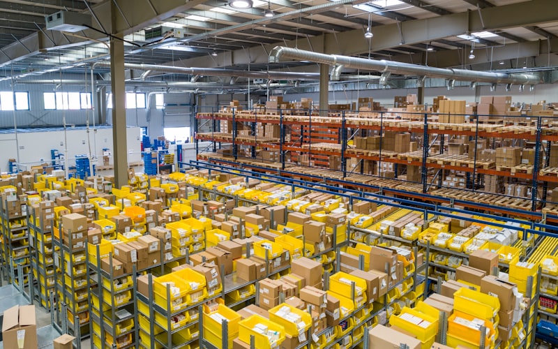 Large warehouse interior with high racking and distribution operations